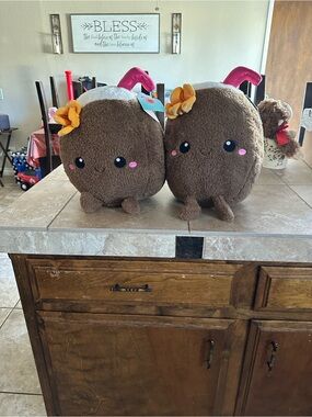Cute Plush Coconut Characters with Pink Blossom